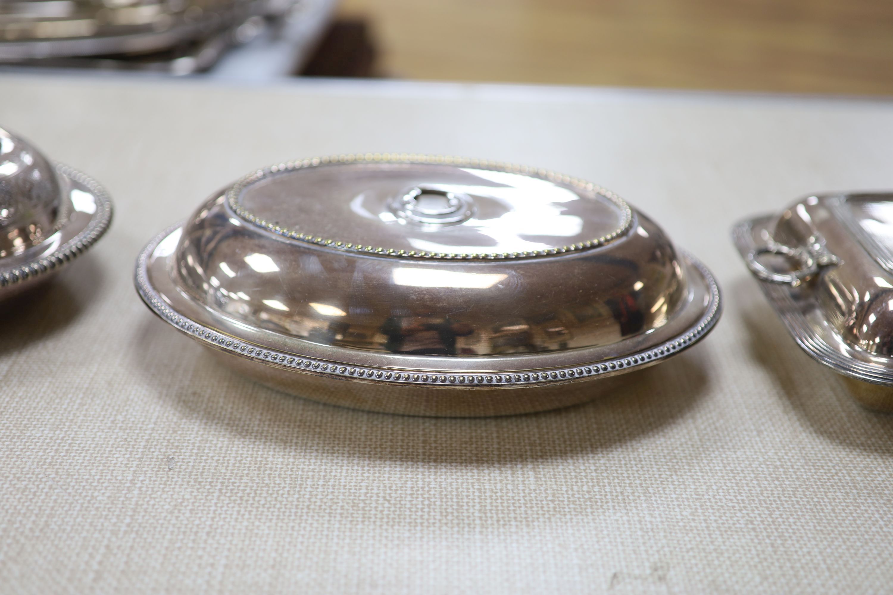 A plated meat dish cover (no handle), length 47cm